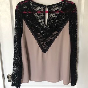 Super cute flowy long sleeve top with lace details